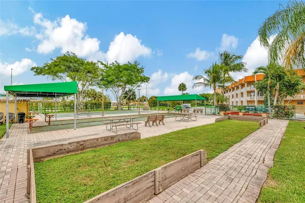 a view of a swimming pool and outdoor space