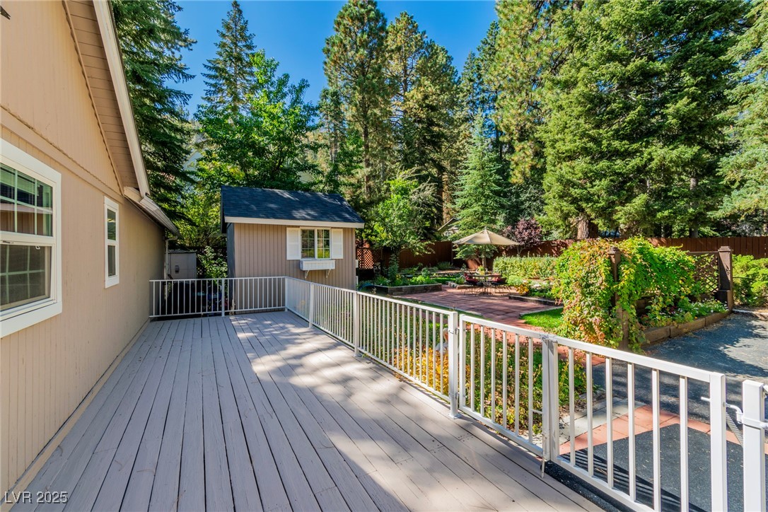 4063 Zugspitz Way Mount Charleston, NV 89124 - Photo 21 of 89 Wooden deck featuring a storage shed