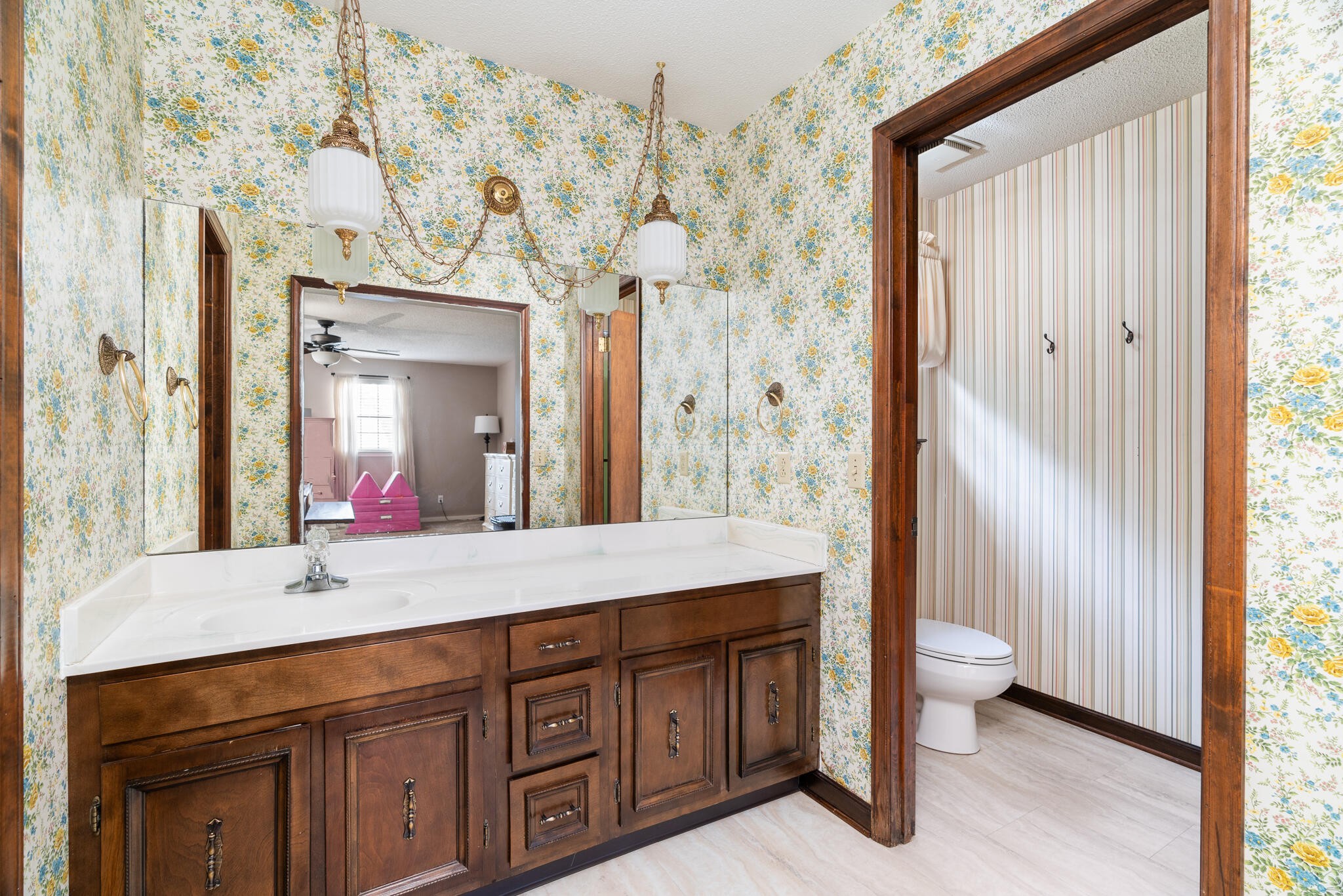 1820 Rock Bluff Road Hixson, TN 37343 - Photo 21 of 31 a bathroom with a sink a toilet and a large mirror
