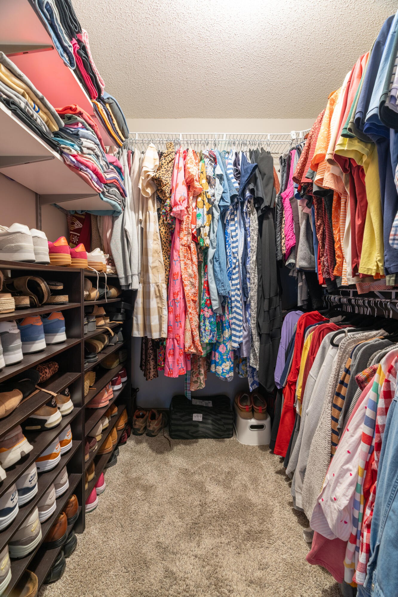 1820 Rock Bluff Road Hixson, TN 37343 - Photo 22 of 31 a view of walk in closet with clothes and shoes