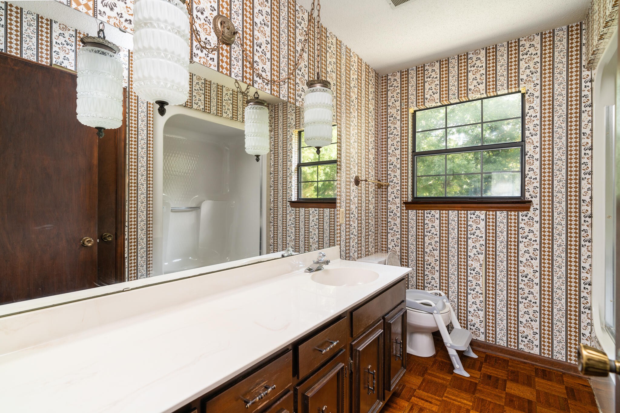 1820 Rock Bluff Road Hixson, TN 37343 - Photo 26 of 31 a bathroom with a sink and a mirror