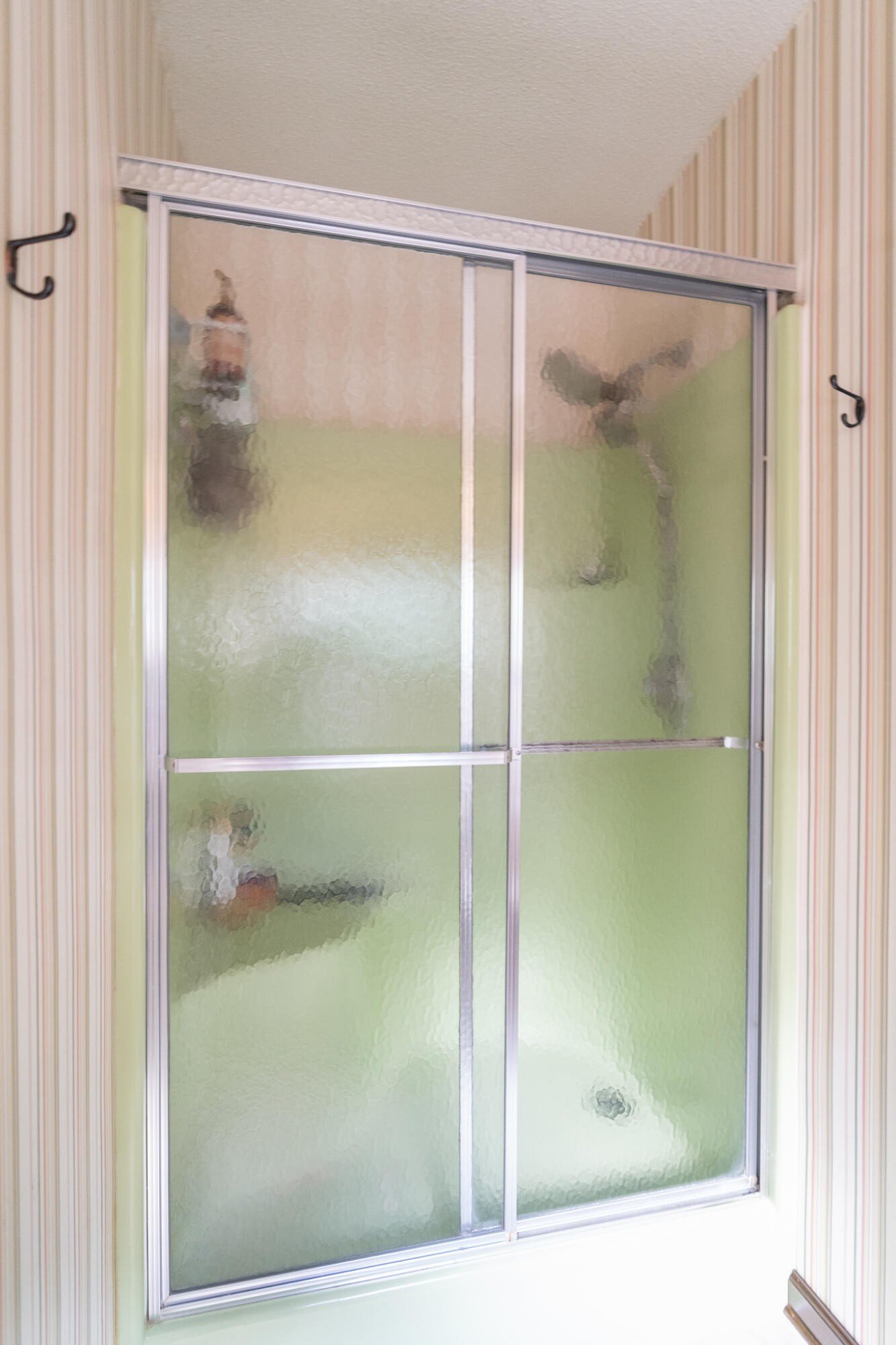 1820 Rock Bluff Road Hixson, TN 37343 - Photo 27 of 31 a bathroom with a glass shower door