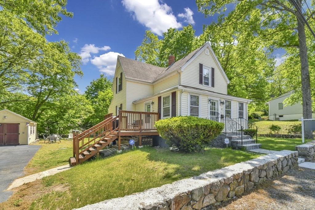 a house view with a garden space