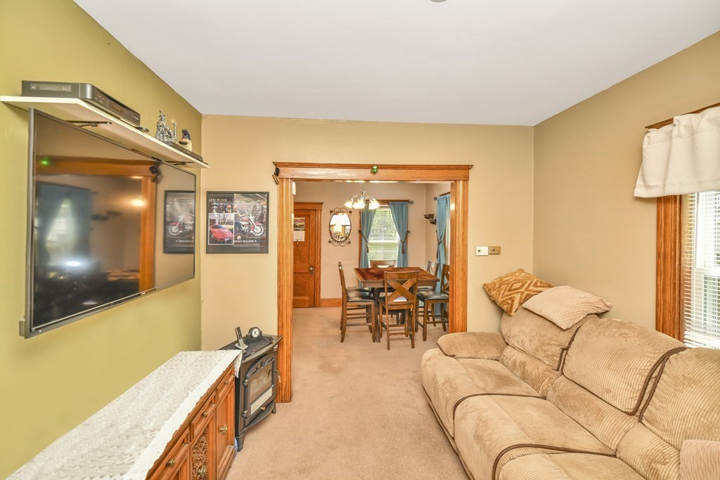 42 Vernon Street Boston, MA 02136 - Photo 5 of 12 a living room with furniture and a flat screen tv