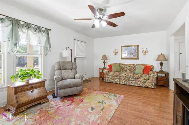 a living room with furniture and a couch