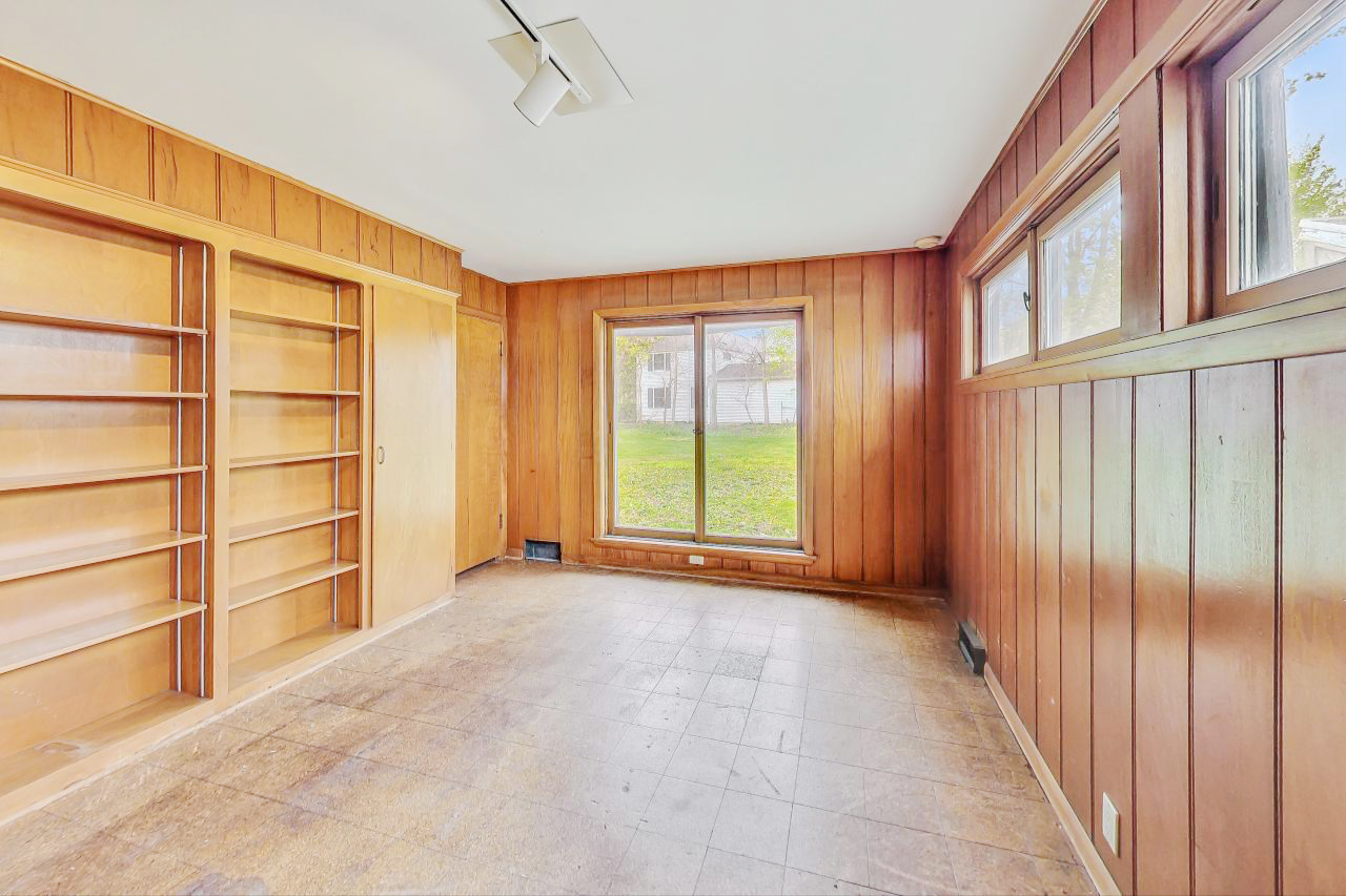 246 Miller Avenue DeKalb, IL 60115 - Photo 24 of 56 a view of an empty room with a window
