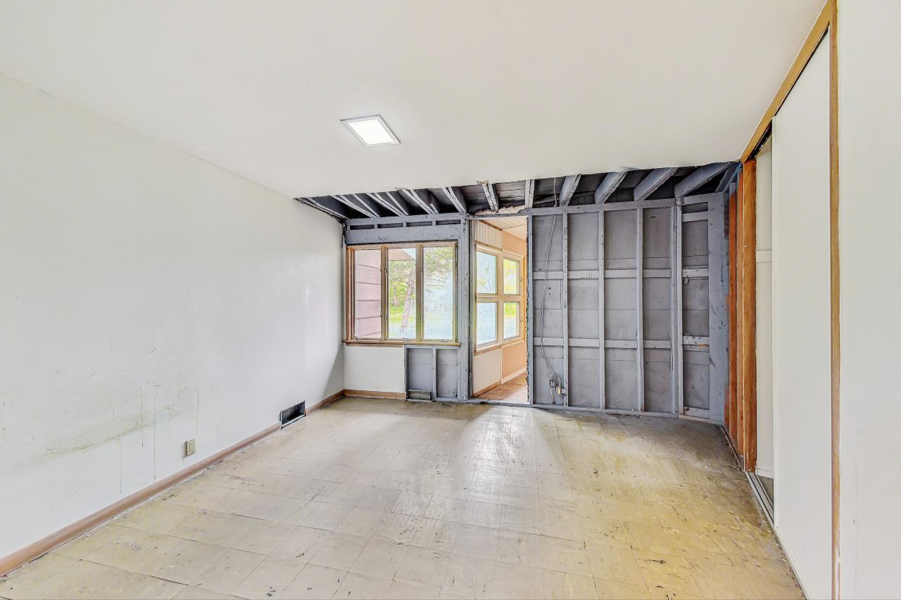 246 Miller Avenue DeKalb, IL 60115 - Photo 34 of 56 a view of an empty room with a window