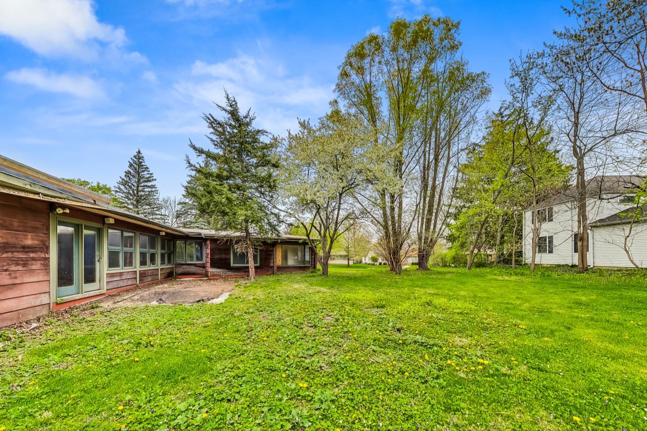 246 Miller Avenue DeKalb, IL 60115 - Photo 54 of 56 a view of a house with a big yard