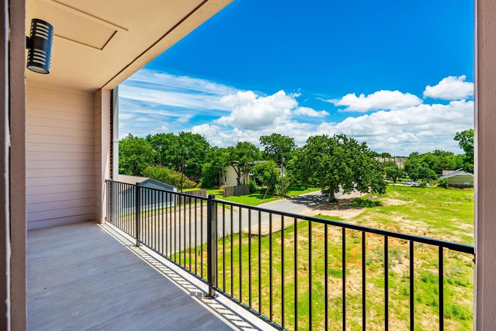 504 South O Connor Road Irving, TX 75060 - Photo 21 of 23 Private balcony featuring a concrete floor and black metal railings