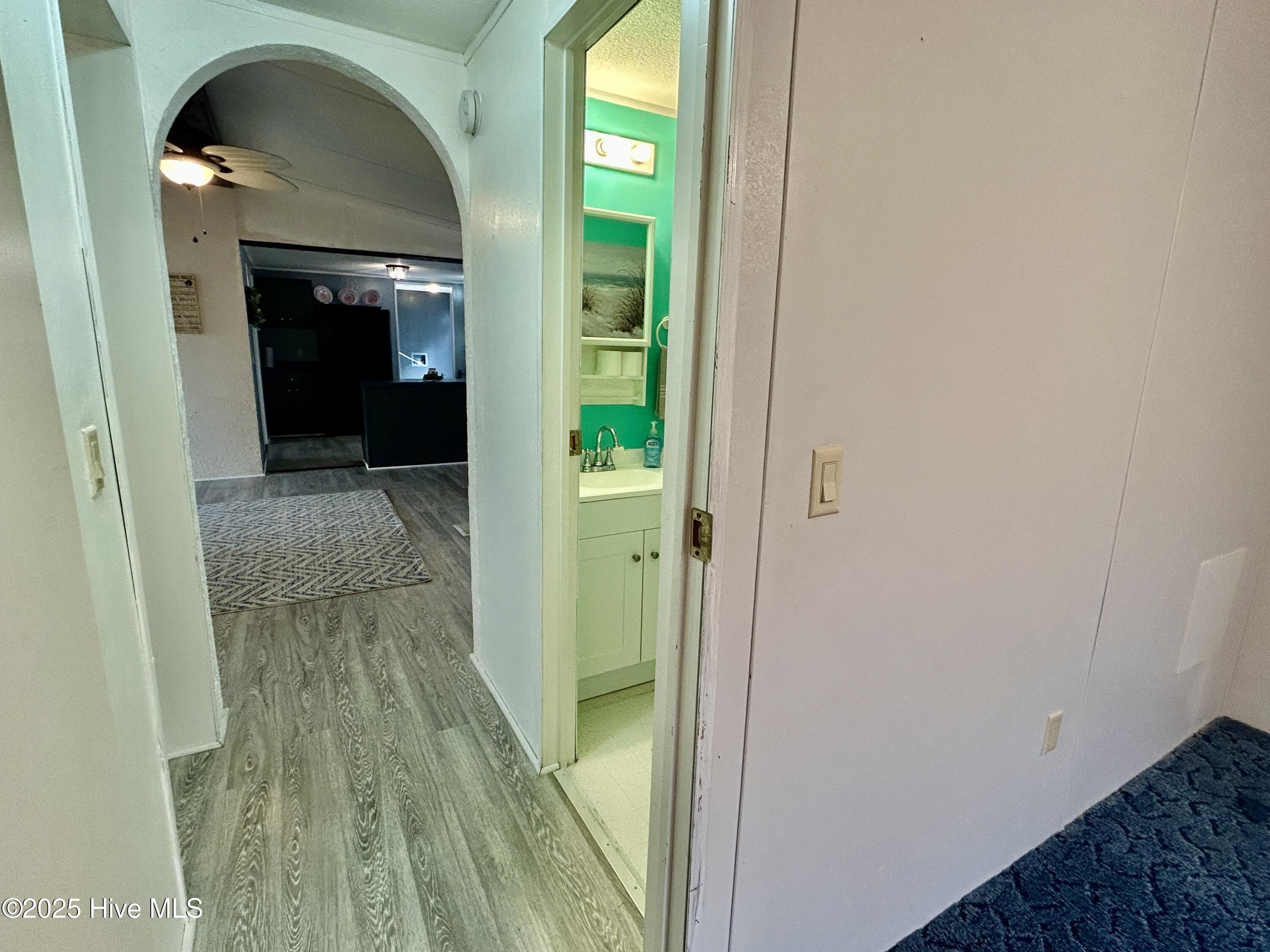 101 Dudley Farm Road Scotland Neck, NC 27874 - Photo 29 of 45 view from BR 3 down private/BR hall looking into living room