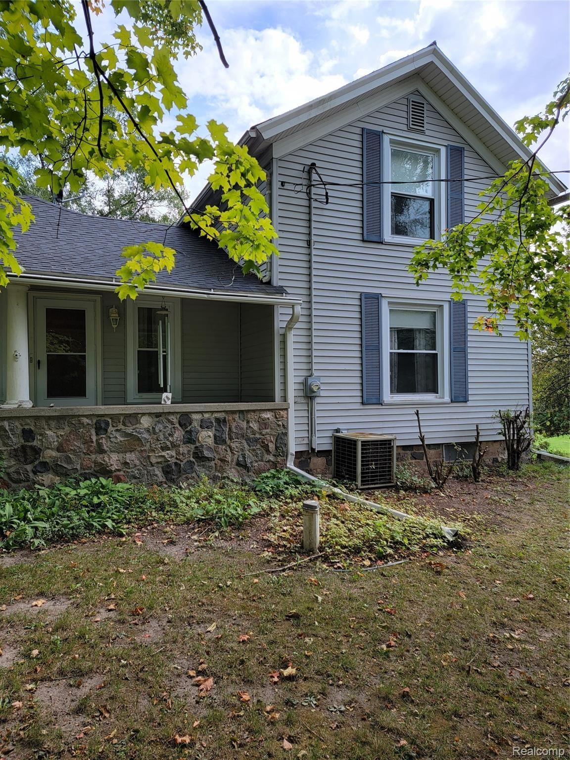 12749 Angle Road Bath, MI 48808 - Photo 9 of 33 Front of House.jpg