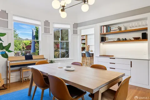 a view of a dining room with furniture