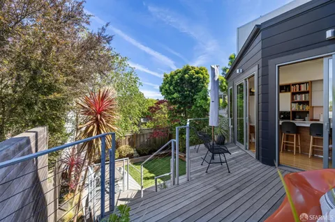 a bathroom with a sink toilet and mirror