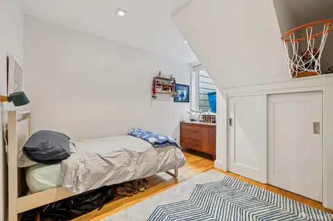 a kitchen with stainless steel appliances a refrigerator and a stove top oven