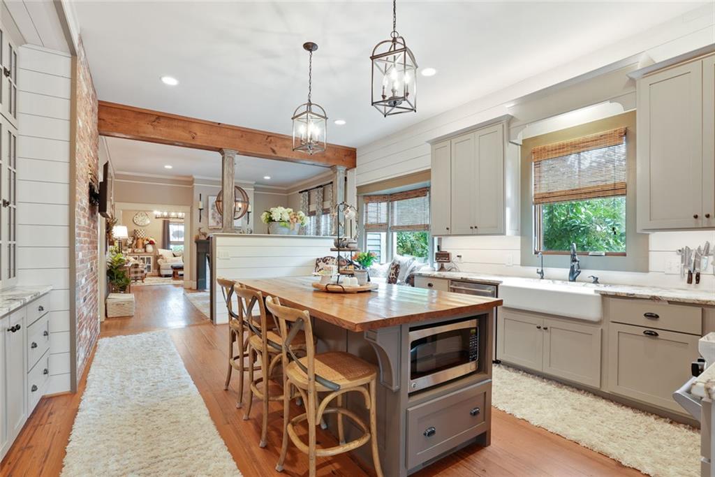 745 Washington Street Clarkesville, GA 30523 - Photo 16 of 54 a kitchen with sink stove and refrigerator