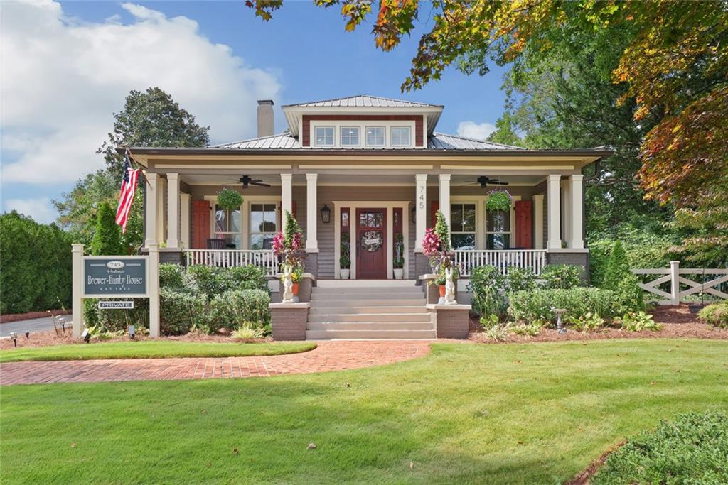745 Washington Street Clarkesville, GA 30523 - Photo 26 of 54 front view of house with a yard