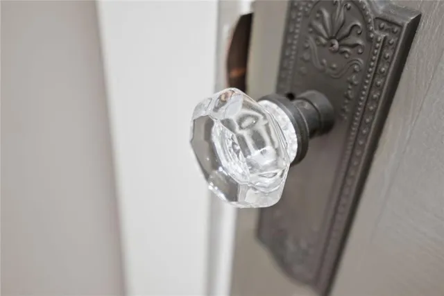 a bed room with a bed and a chair