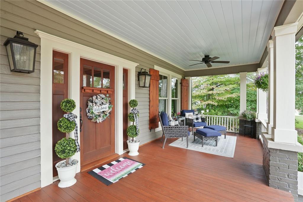 745 Washington Street Clarkesville, GA 30523 - Photo 6 of 54 a living room with furniture and a floor to ceiling window