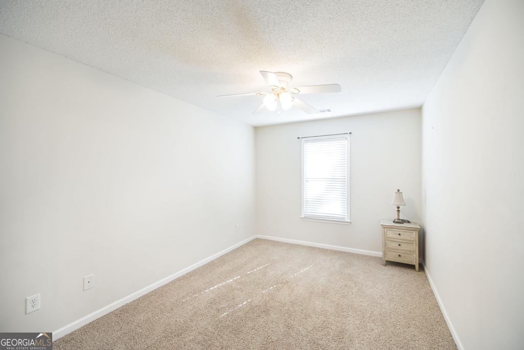 209 Mossy Ridge Warner Robins, GA 31088 - Photo 16 of 38 a view of empty room with a window