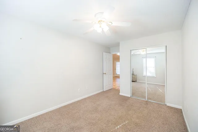 an empty room with a bathroom