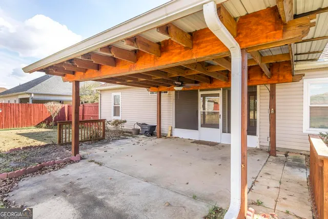 a view of a house with a patio
