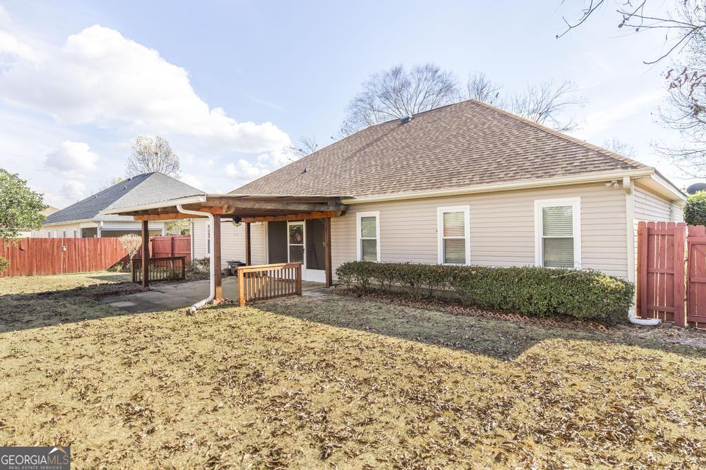 209 Mossy Ridge Warner Robins, GA 31088 - Photo 34 of 38 a front view of a house with a yard