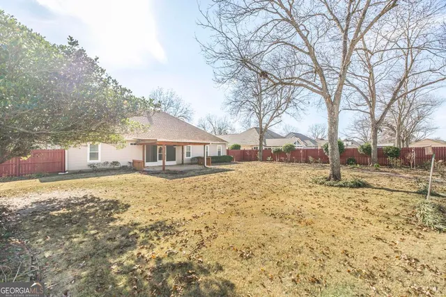 a house with trees in front of it