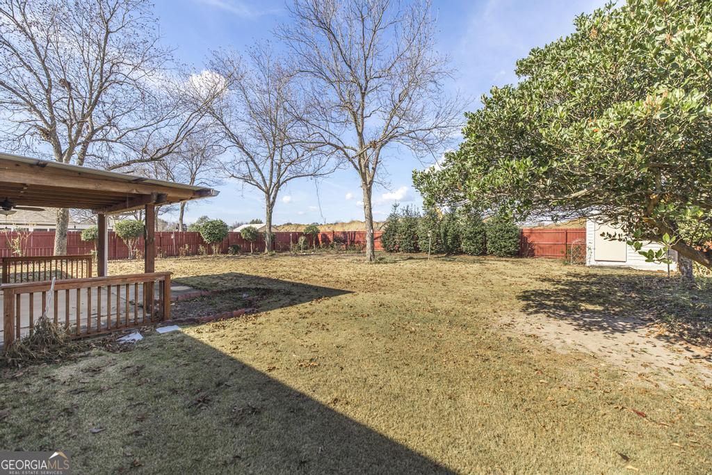 209 Mossy Ridge Warner Robins, GA 31088 - Photo 38 of 38 a view of road with large trees
