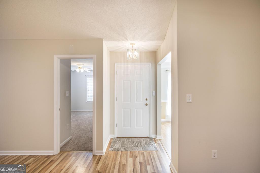 209 Mossy Ridge Warner Robins, GA 31088 - Photo 6 of 38 a view of a room with wooden floor and bathroom