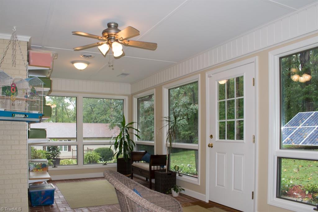 408 Brown Road King, NC 27021 - Photo 12 of 29 Additional enclosed back porch photo giving glimpse of apartment/in-law suite to back left of house.