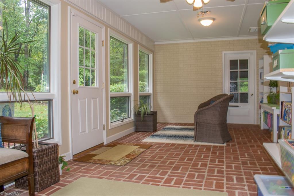 408 Brown Road King, NC 27021 - Photo 13 of 29 Heated/cooled back enclosed porch.