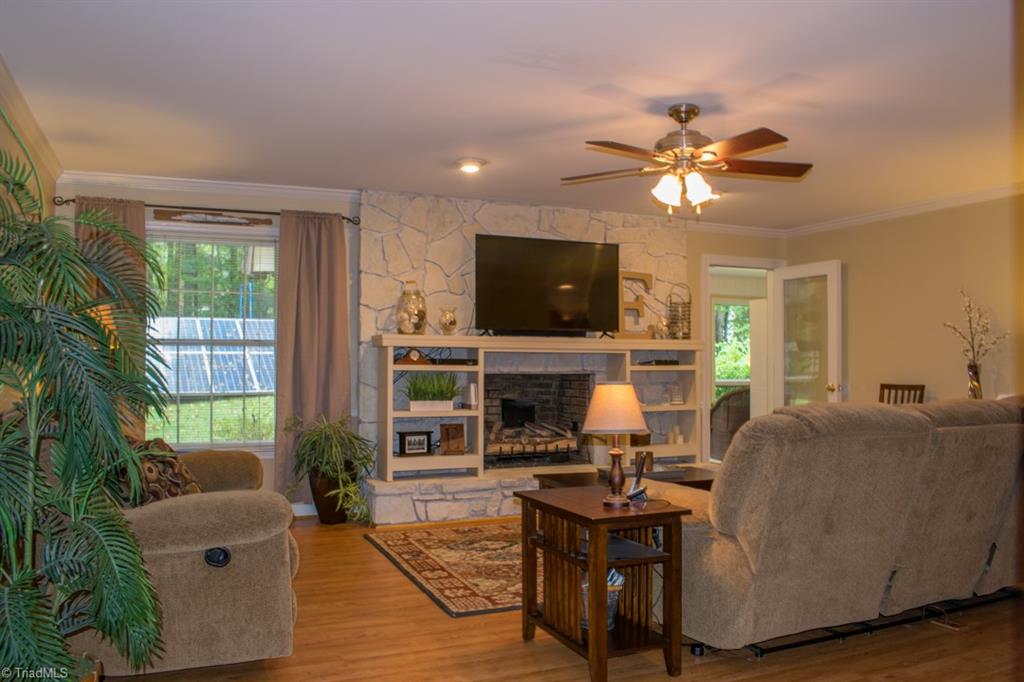 408 Brown Road King, NC 27021 - Photo 7 of 29 Den on main floor with gas logs in fireplace.