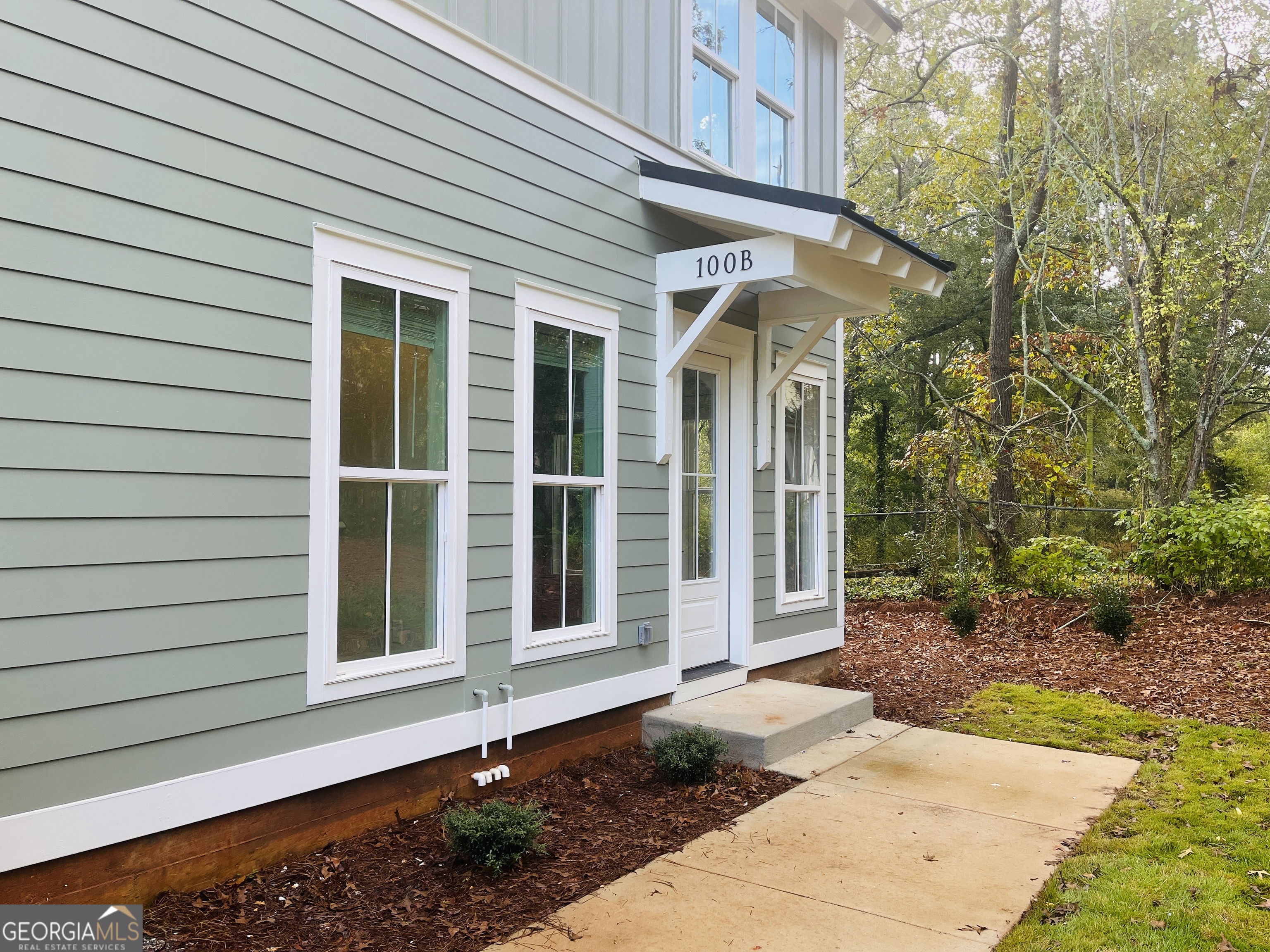 100 Gardenia Lane, Unit 100B LaGrange, GA 30240 - Photo 4 of 21 a view of a house with a yard