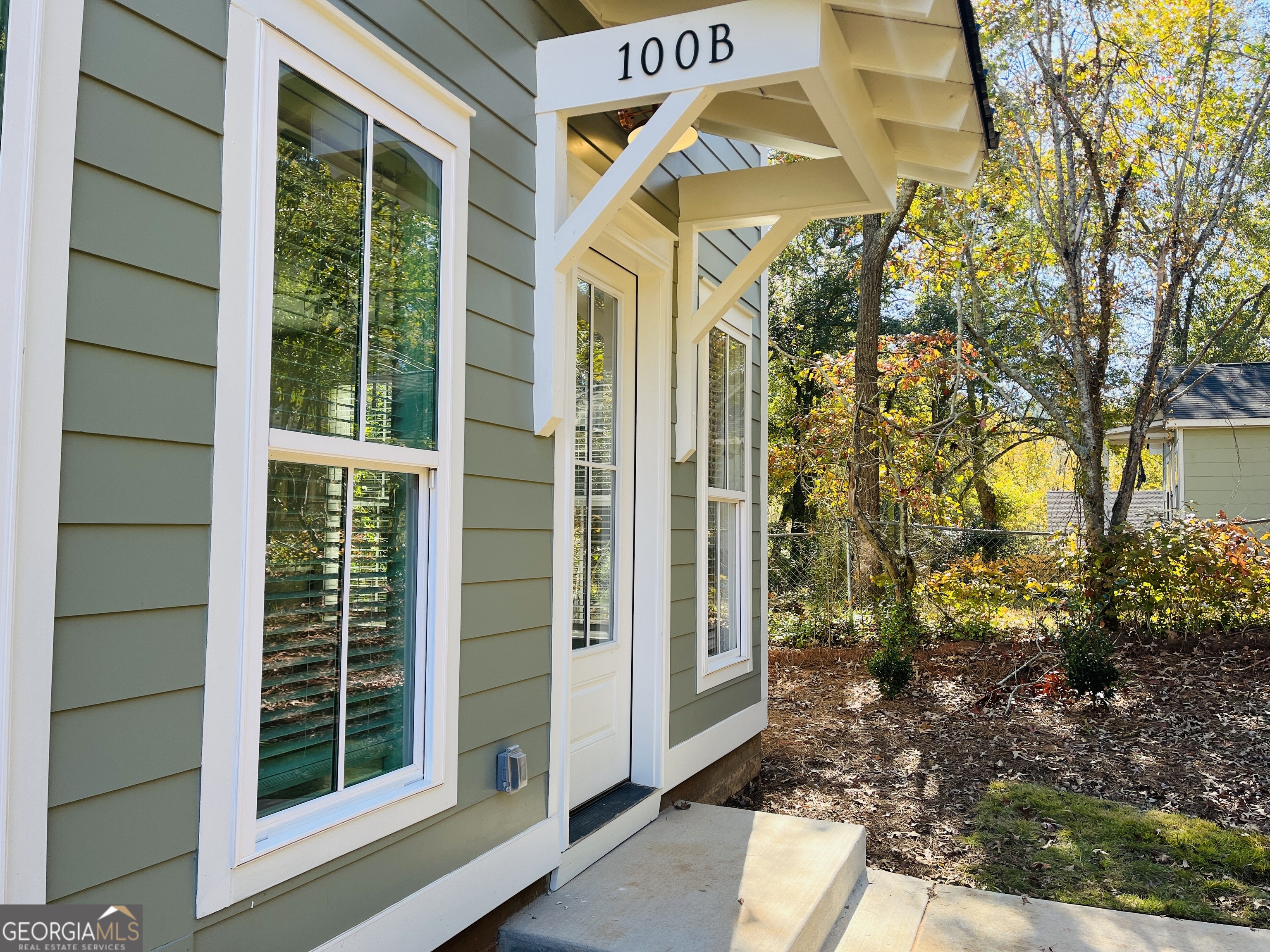 100 Gardenia Lane, Unit 100B LaGrange, GA 30240 - Photo 6 of 21 a view of yellow house with a large window