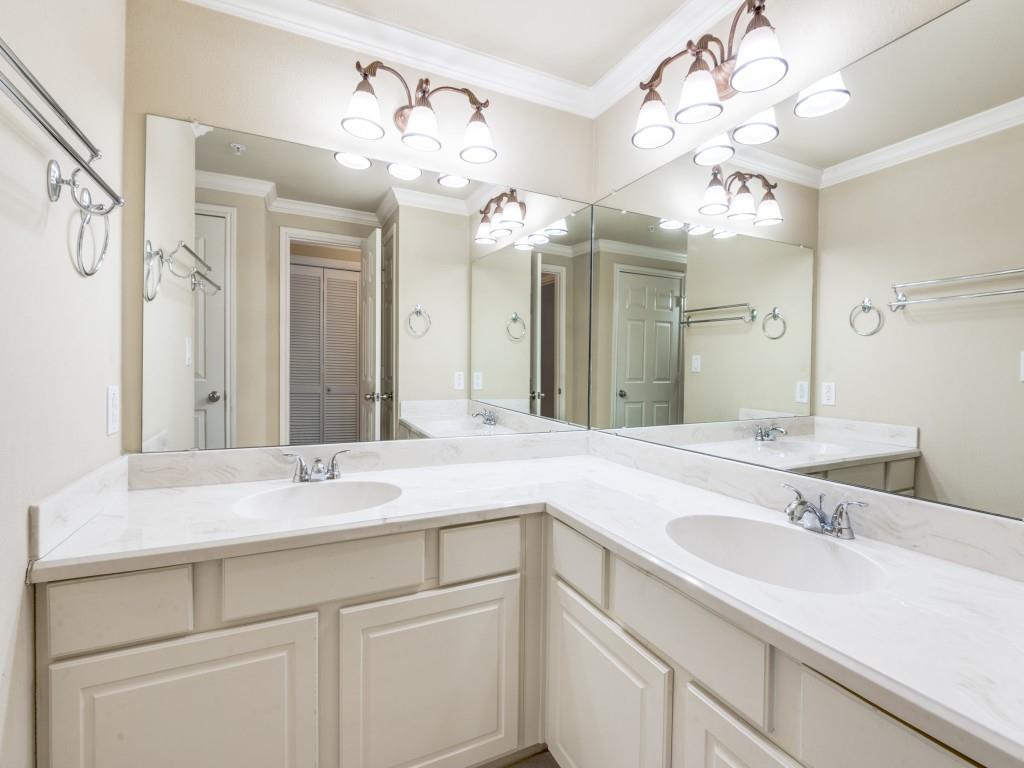 2601 Preston Road, Unit 6109 Plano, TX 75093 - Photo 7 of 13 a bathroom with a sink vanity and a mirror