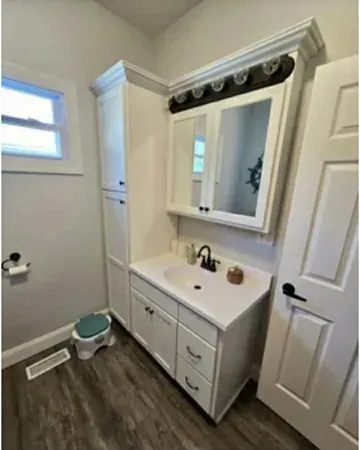 a living room with baby toys