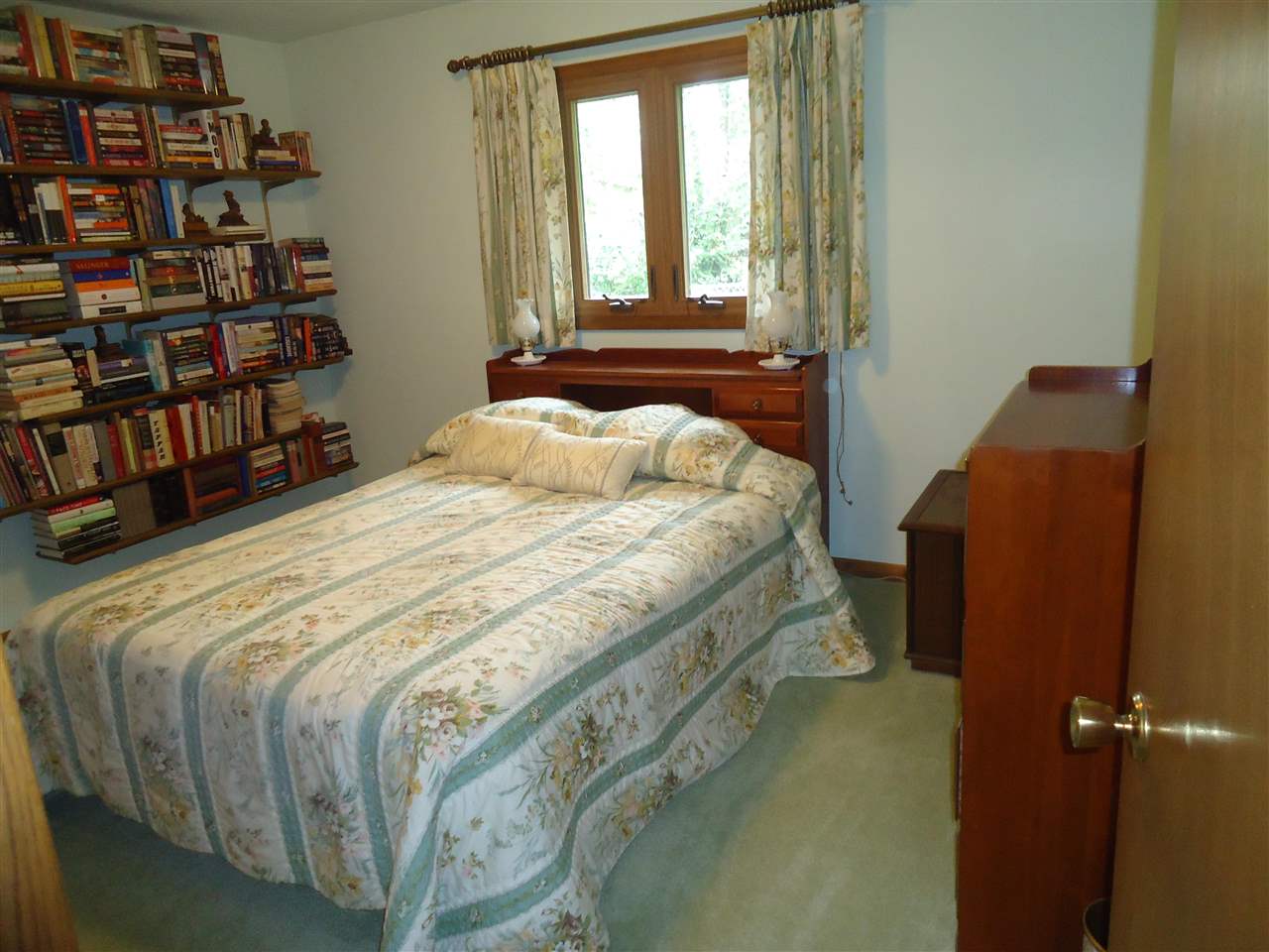 5224 Brookview Road Rockford, IL 61107 - Photo 12 of 22 a bedroom with a bed furniture and a window