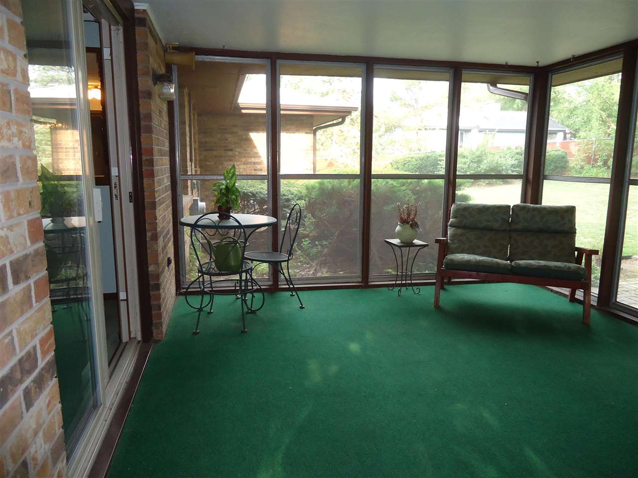 5224 Brookview Road Rockford, IL 61107 - Photo 15 of 22 a living room with furniture and a garden