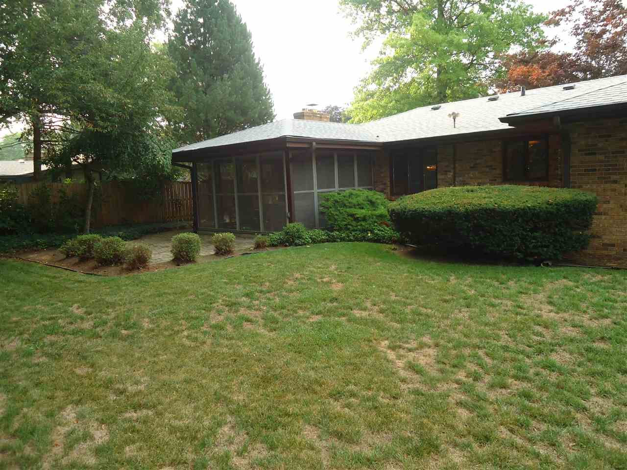5224 Brookview Road Rockford, IL 61107 - Photo 18 of 22 a view of a house with a garden