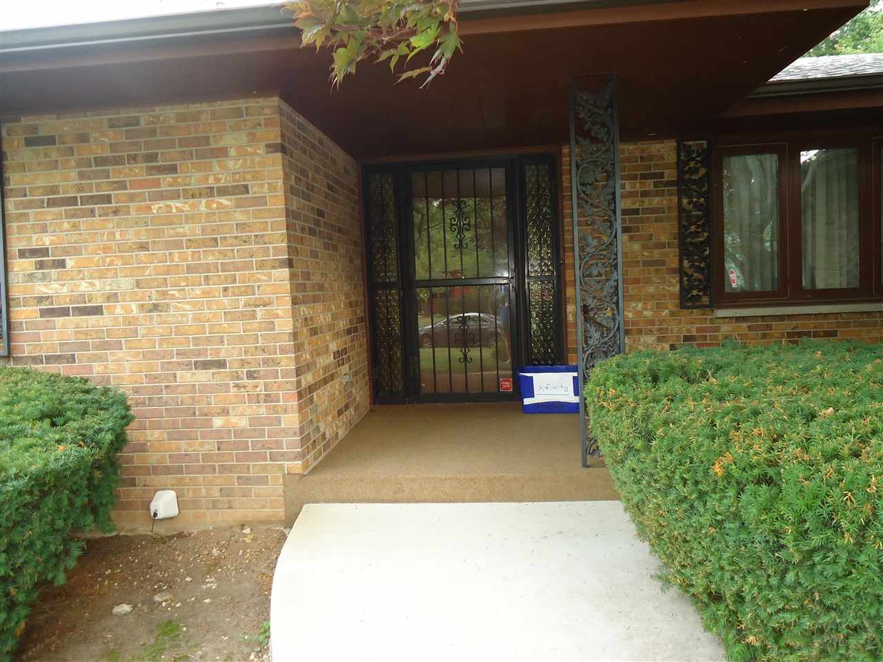 5224 Brookview Road Rockford, IL 61107 - Photo 2 of 22 a view of entrance door of the house