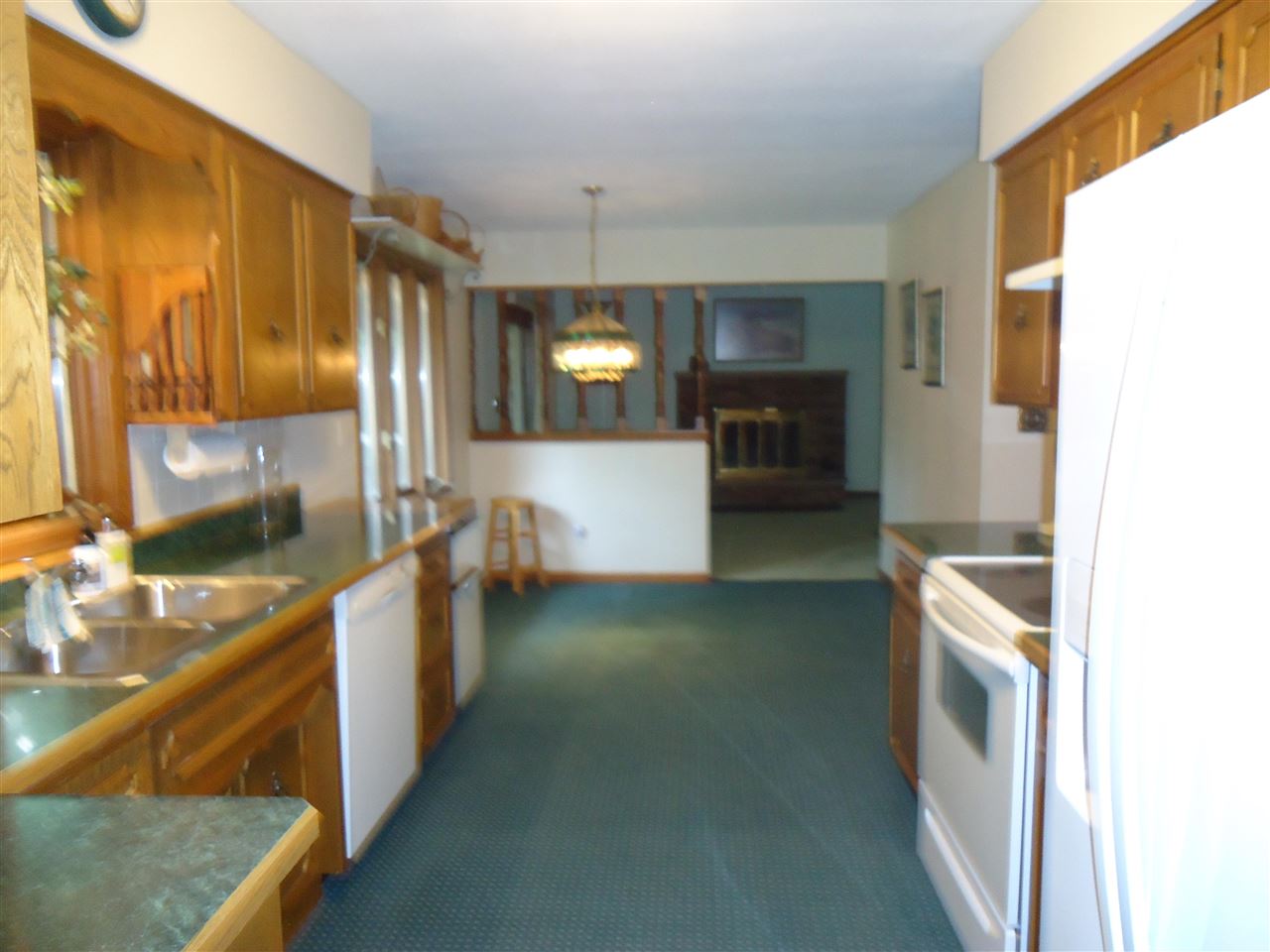 5224 Brookview Road Rockford, IL 61107 - Photo 8 of 22 a kitchen with stainless steel appliances granite countertop a sink and a stove