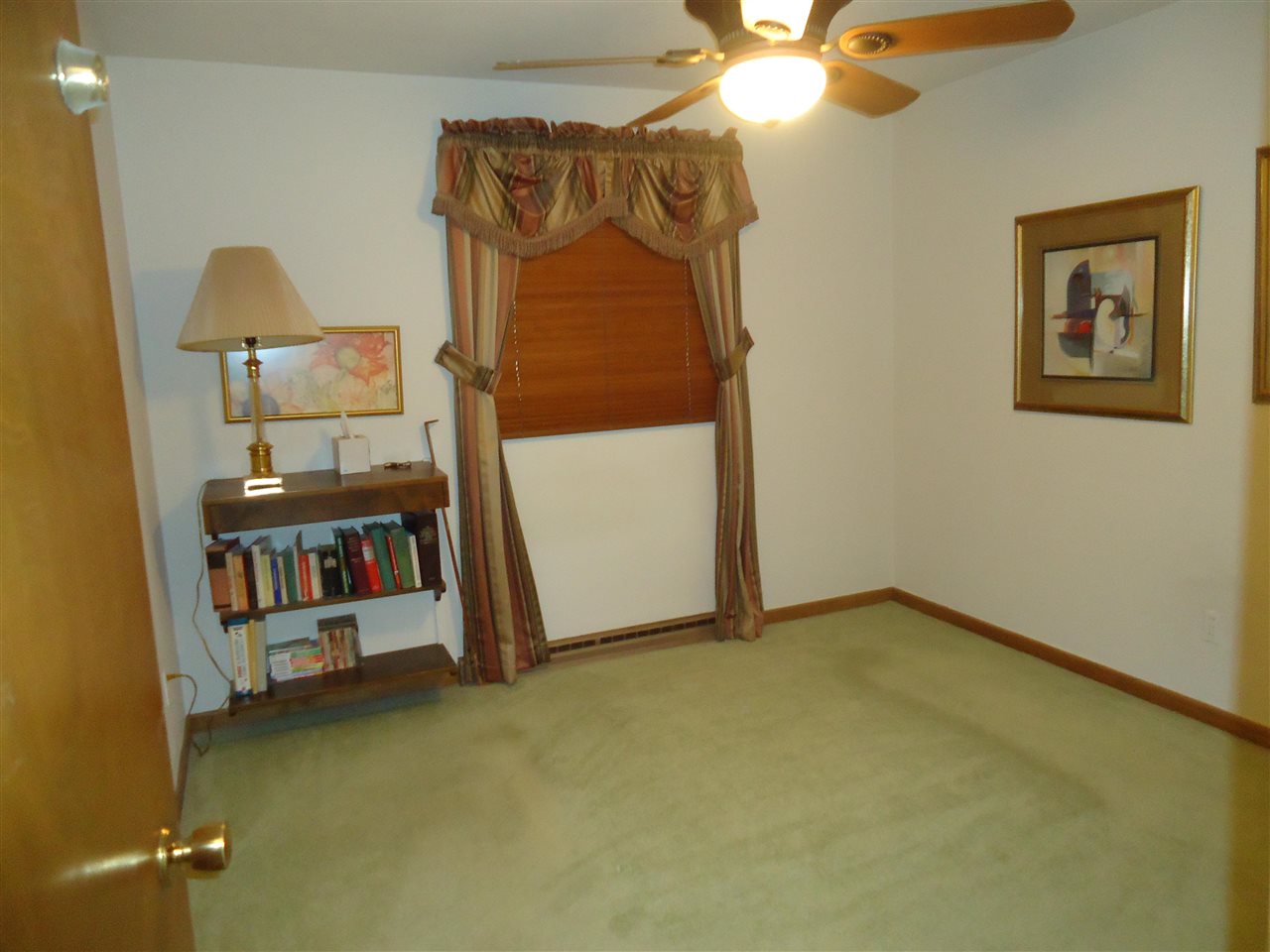 5224 Brookview Road Rockford, IL 61107 - Photo 10 of 22 a view of an empty room with a window