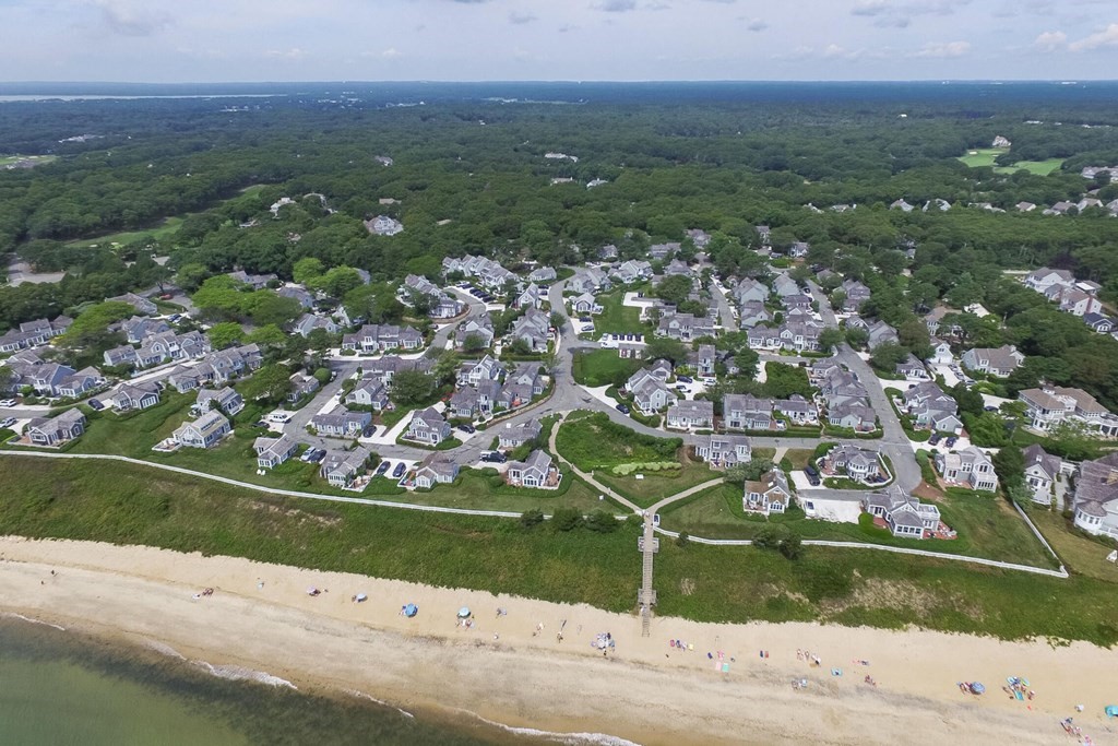 16 Brant Rock Road Mashpee, MA 02649 - Photo 21 of 22 an aerial view of a house with a yard and lake view