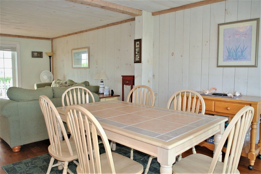 16 Brant Rock Road Mashpee, MA 02649 - Photo 6 of 22 a view of a dining room and wooden floor