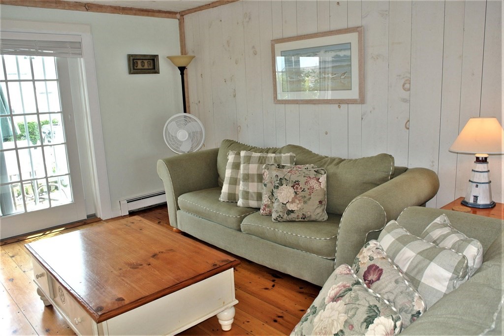 16 Brant Rock Road Mashpee, MA 02649 - Photo 9 of 22 a living room with furniture and a window