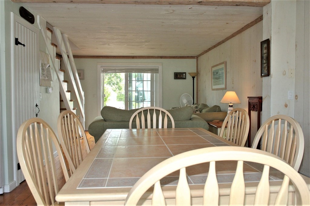 16 Brant Rock Road Mashpee, MA 02649 - Photo 10 of 22 a view of a livingroom with furniture and windows