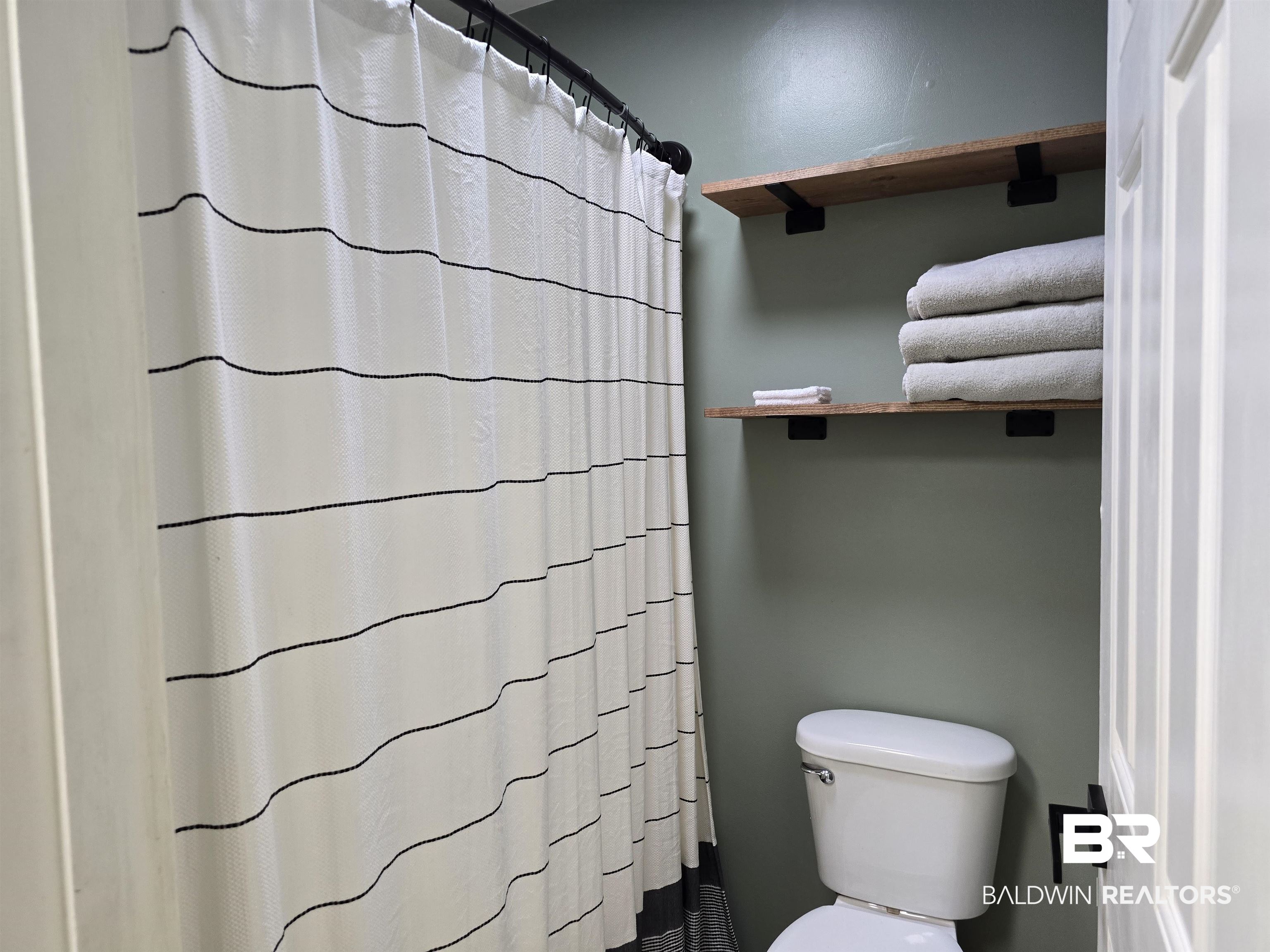 21235 Highway 31 Flomaton, AL 36441 - Photo 13 of 23 Bathroom featuring a shower with curtain