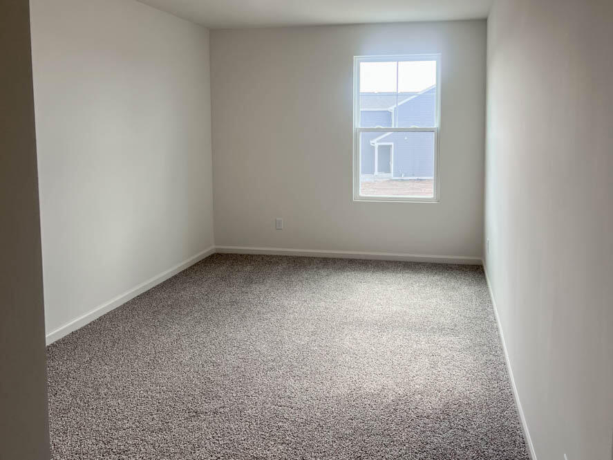 7174 Fair Oaks Road Mount Pleasant, WI 53403 - Photo 7 of 26 Upstairs bedroom number 2