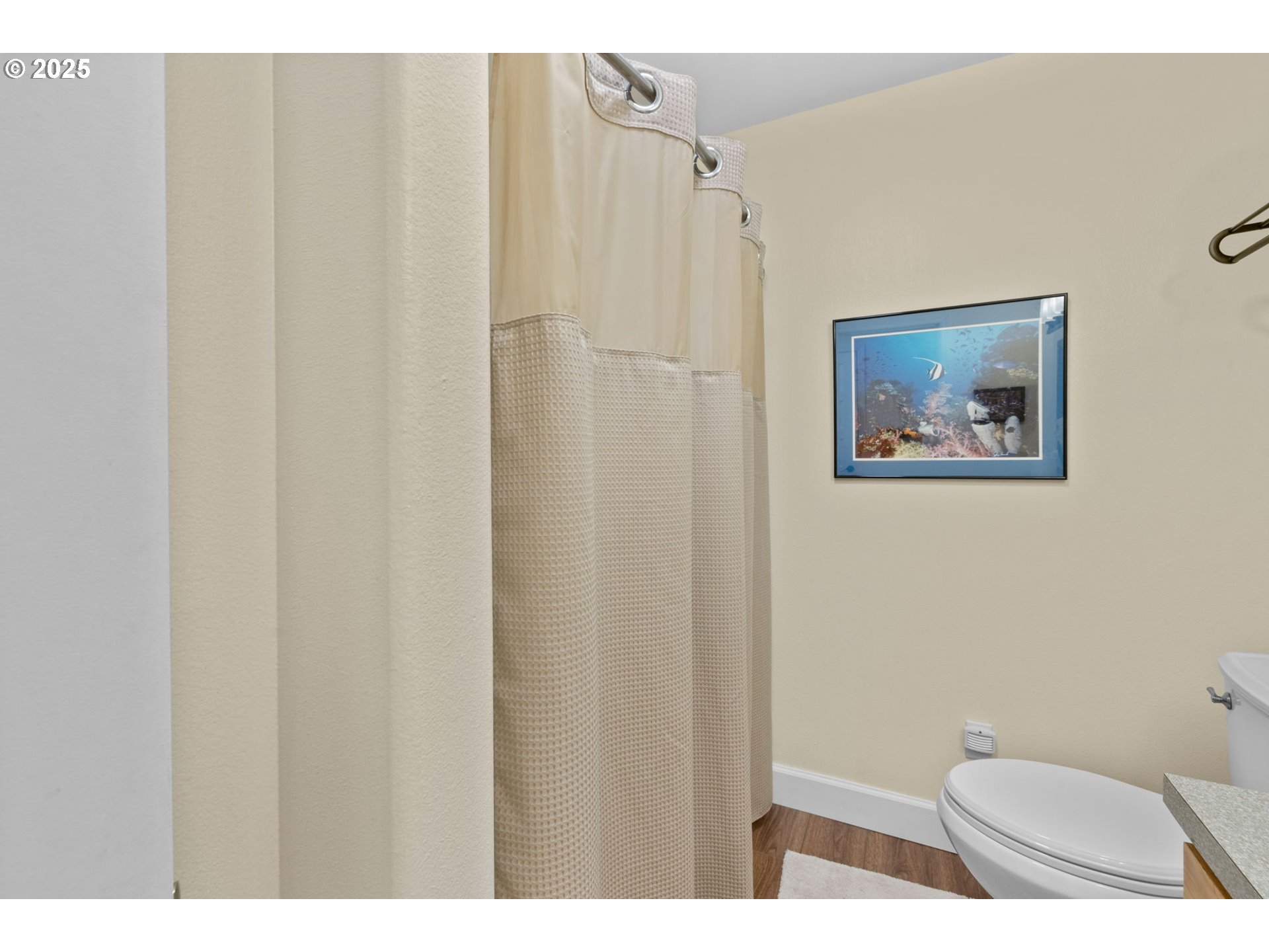 420 Elk Creek Road, Unit 503 Cannon Beach, OR 97110 - Photo 14 of 25 a bathroom with a toilet and a shower
