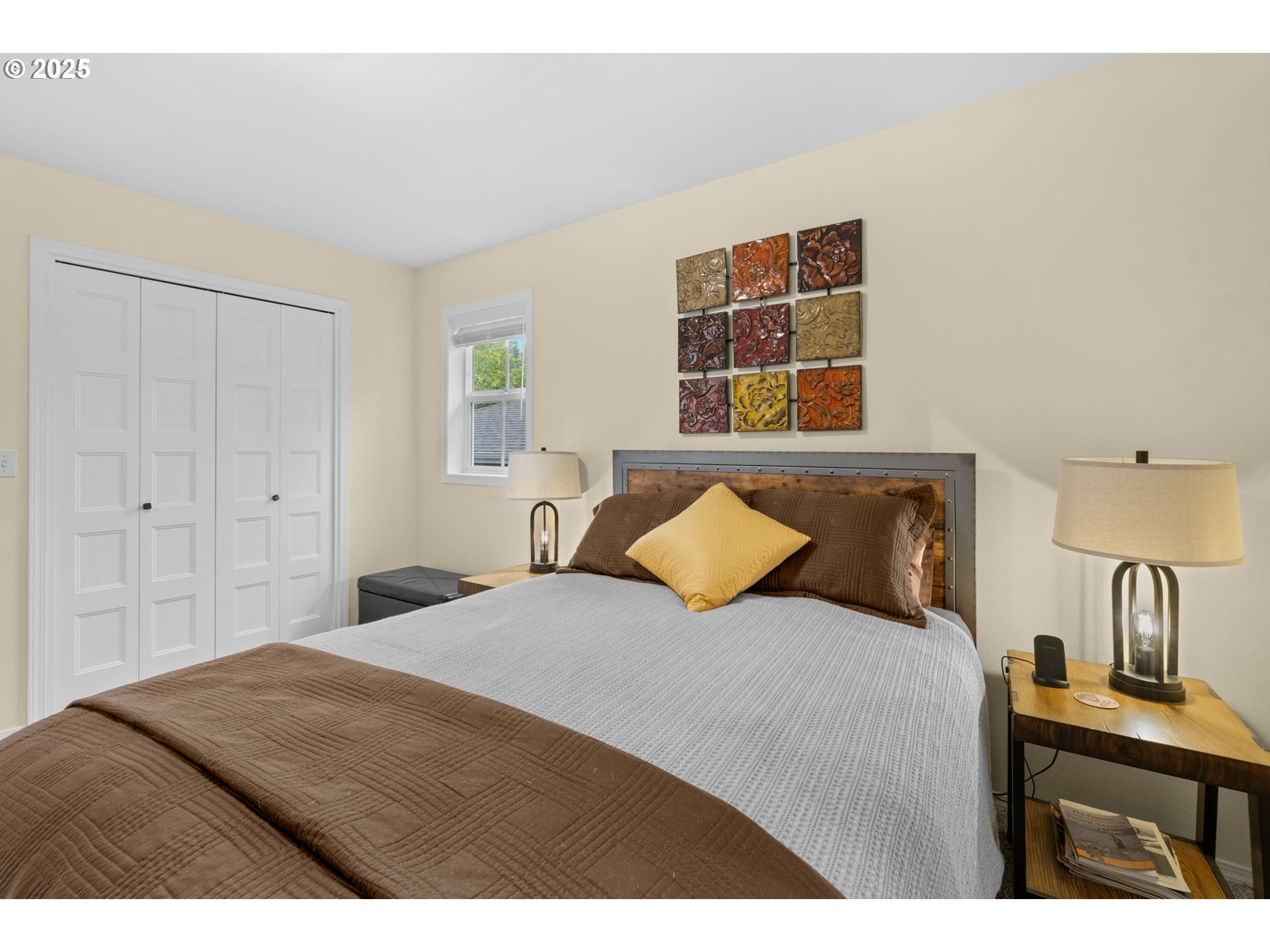 420 Elk Creek Road, Unit 503 Cannon Beach, OR 97110 - Photo 21 of 25 a bedroom with a bed and a desk